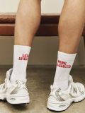 Less upsetti white socks ON VACATION
